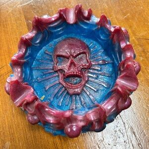 Resin skull ashtray 5” by 2” - edges decorated with skull heads- fun piece -new